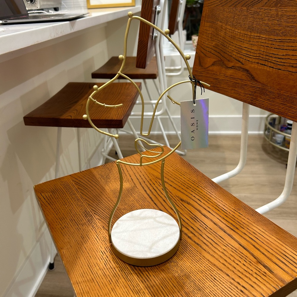 Gold face jewelry stand